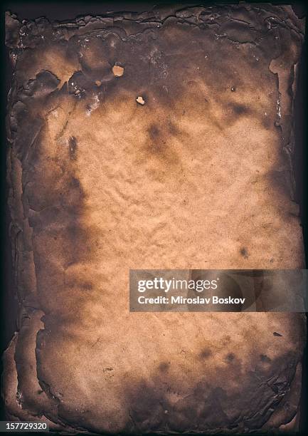 high resolution burnt paper sheets vignette grunge texture - burnt stockfoto's en -beelden