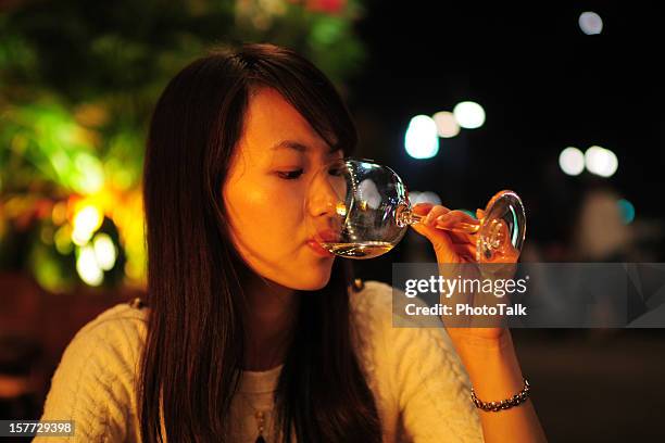 beautiful woman drinking red wine - champange bottle and valentines day stock pictures, royalty-free photos & images