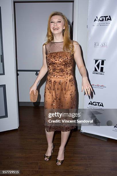 Actress Jacqueline Emerson attends fashion designer Kevan Hall's Spring 2013 Collection on December 5, 2012 in Los Angeles, California.