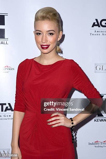 Actress Christian Serratos attends fashion designer Kevan Hall's Spring 2013 Collection on December 5, 2012 in Los Angeles, California.
