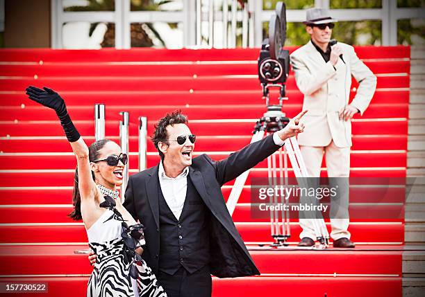 celebrity paar auf roten teppich in cannes - red carpet hospitality gala stock-fotos und bilder