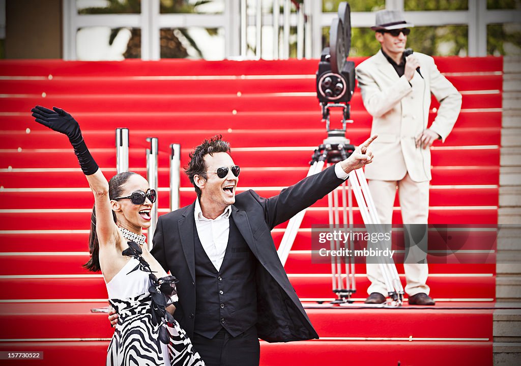 Celebrity couple on red carpet in Cannes