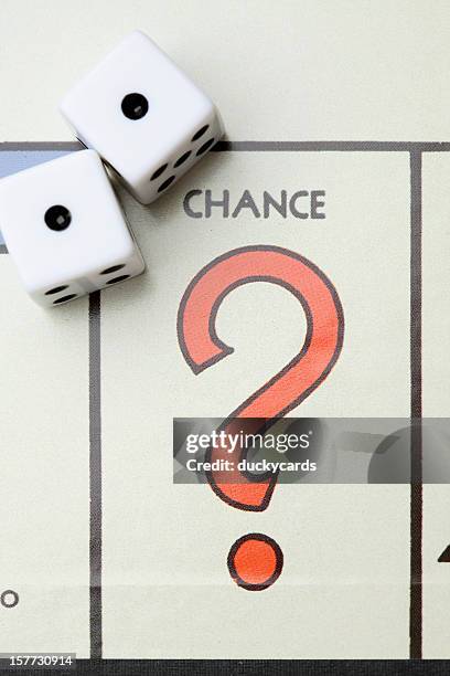 monopoly game board chance with dice. - monopoly chance stock pictures, royalty-free photos & images