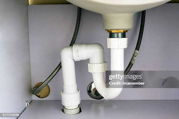bathroom sink plumbing system in cabinet - pipe stock pictures, royalty-free photos & images