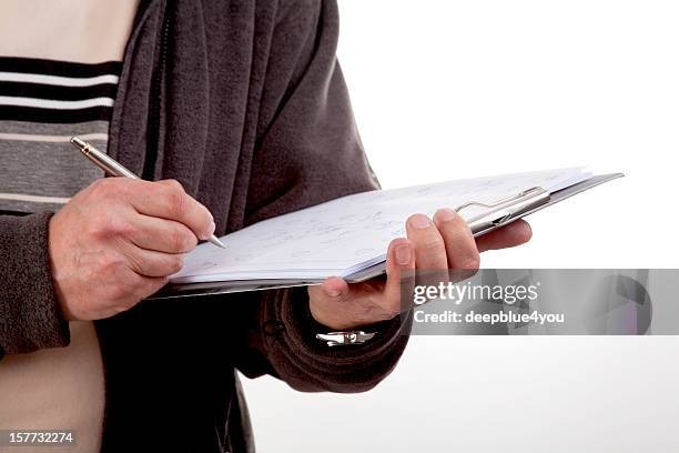 service employee taking notes on a clipboard about construction change - shorthand stock pictures, royalty-free photos & images