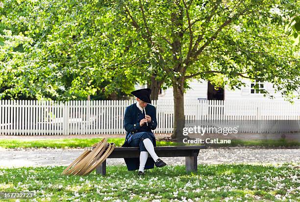 colonial man with flute - williamsburg virginia stock pictures, royalty-free photos & images