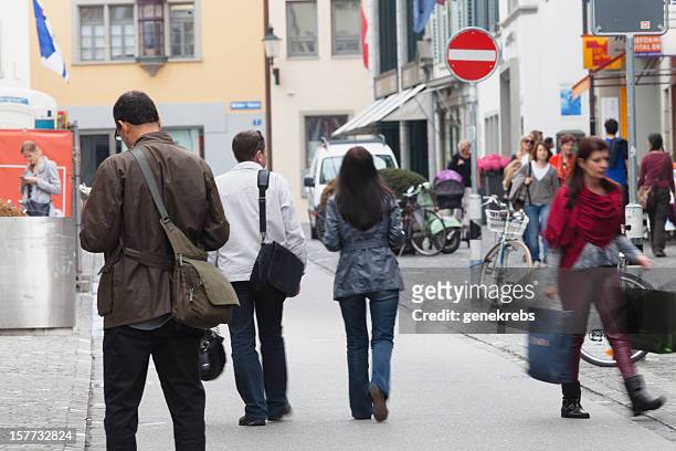 young people shopping on spring afternoon, zurich - rennweg stock pictures, royalty-free photos & images