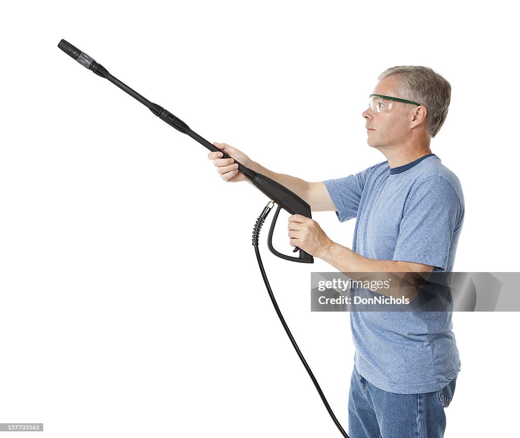 Man Cleaning with a Pressure Washer