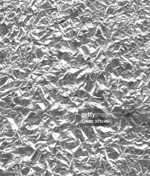 arrugado de papel de aluminio - papel de aluminio fotografías e imágenes de stock
