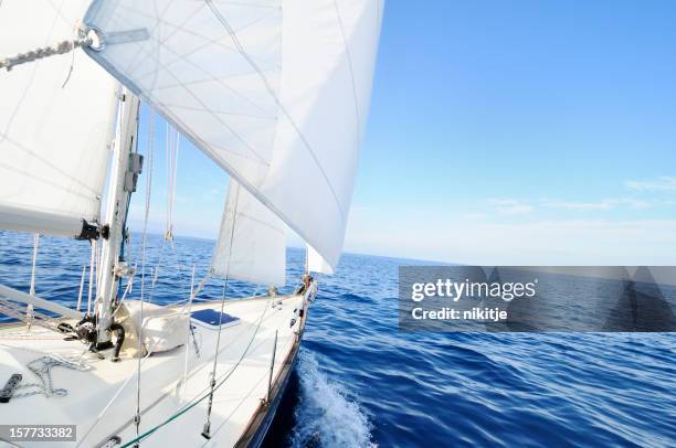 sailing boat at the sea - scheepsonderdeel stockfoto's en -beelden