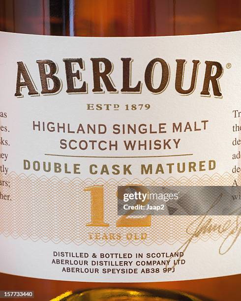 label on bottle of aberlour hihgland single malt scotch whisky - scotch whisky stock pictures, royalty-free photos & images