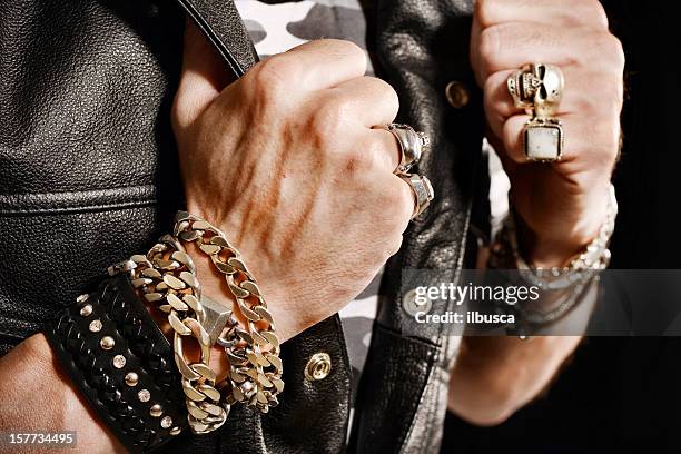 rocker/biker studio portraits - wristband stock pictures, royalty-free photos & images