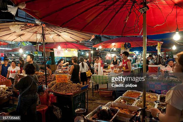 chiang mai night bazaar, thailand - chiang mai province stock pictures, royalty-free photos & images