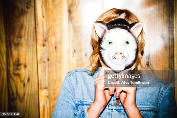 portrait of a woman wearing a mask - cat wearing a mask stock pictures, royalty-free photos & images