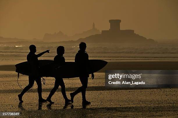 surfin' st.ouen, jersey. - jersey channel islands stock pictures, royalty-free photos & images