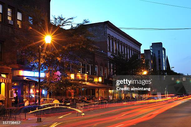 downtown ithaca at night - ithaca new york stock pictures, royalty-free photos & images