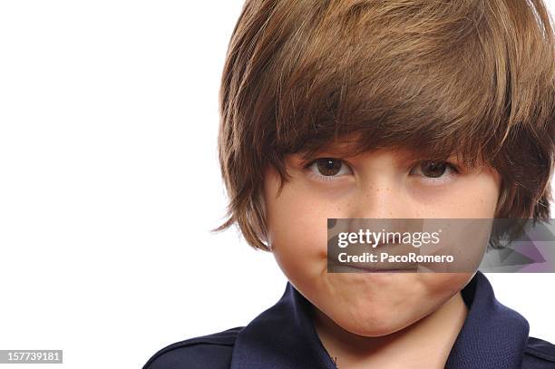 handsome little boy with angry expression - bruine ogen stockfoto's en -beelden