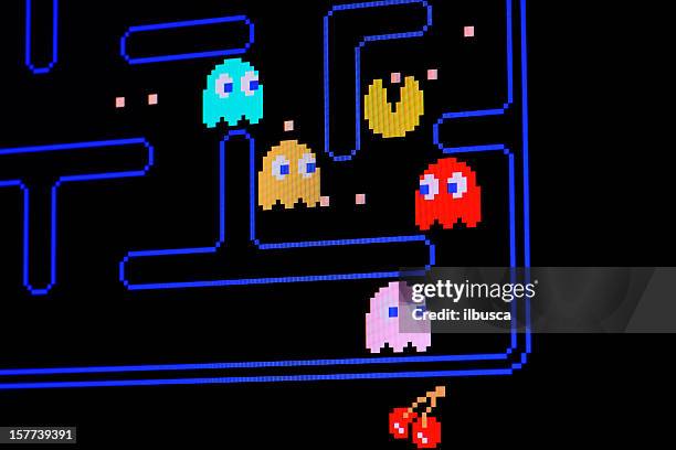 vintage pacman videojuegos - sala de máquinas recreativas fotografías e imágenes de stock