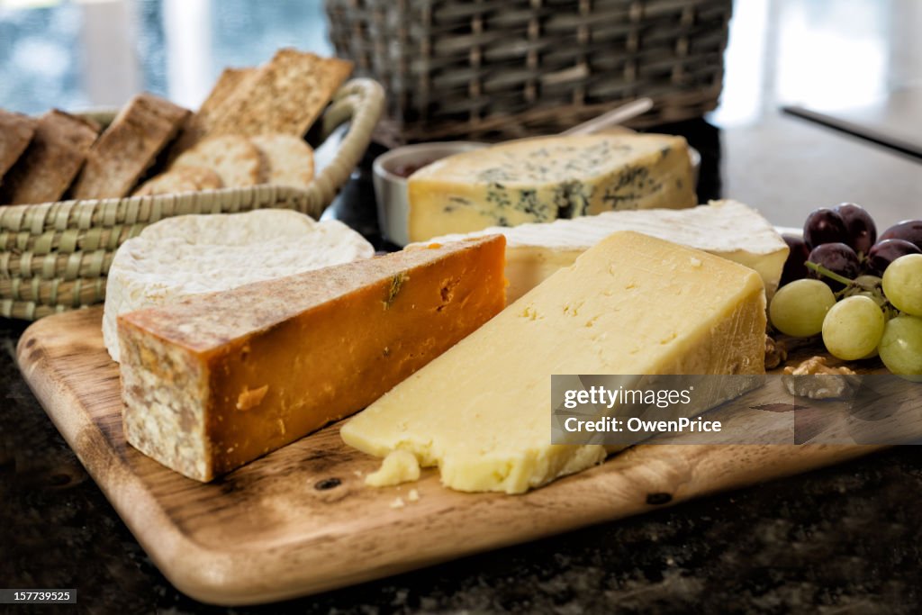 Selection of English and French Cheese on Rustic board