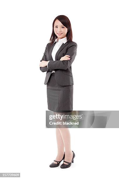 confident chinese businesswoman arms crossed smiling - skirt stock pictures, royalty-free photos & images
