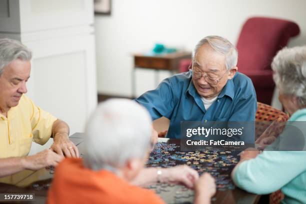 retirement - senior puzzle stock pictures, royalty-free photos & images