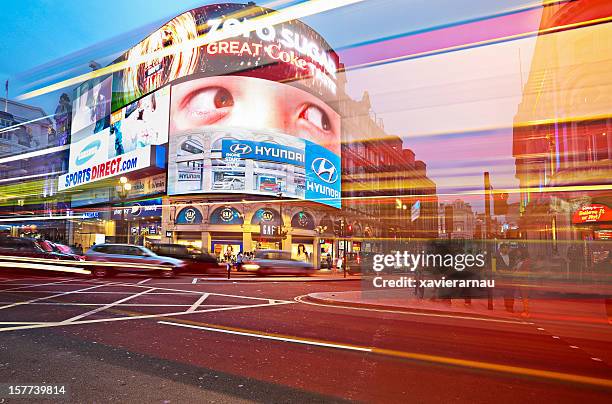 piccadilly circus at dusk - piccadilly circus stock pictures, royalty-free photos & images