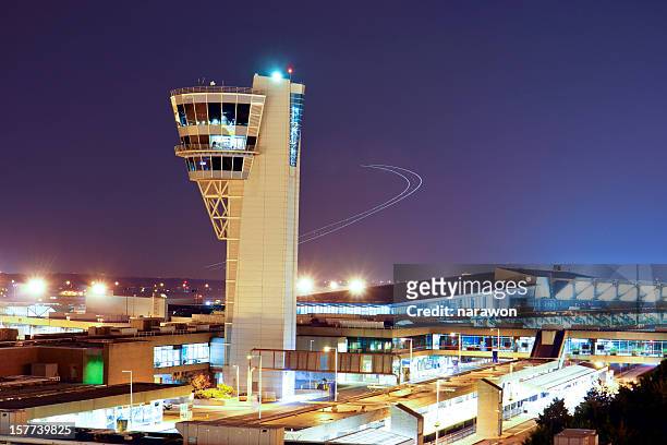 airport control tower in dusk - control tower stock pictures, royalty-free photos & images