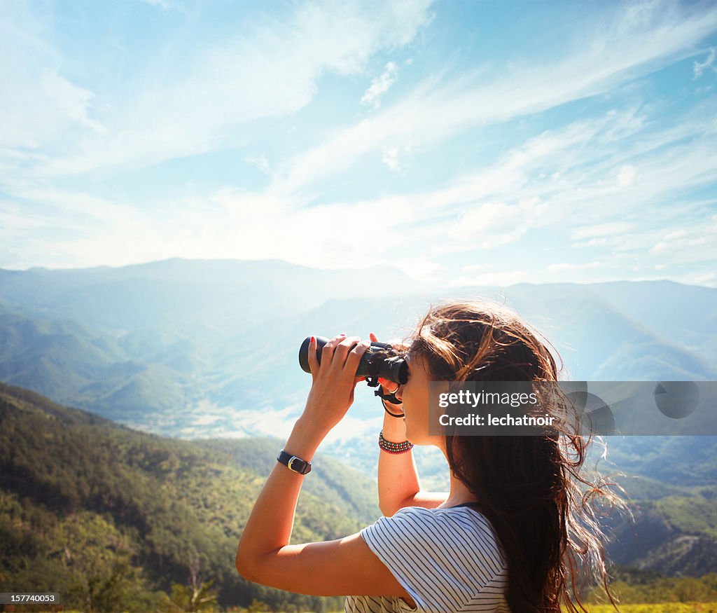 Looking through the binoculars