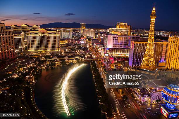arial view of las vegas strip at sunset - trump hotel las vegas stock pictures, royalty-free photos & images