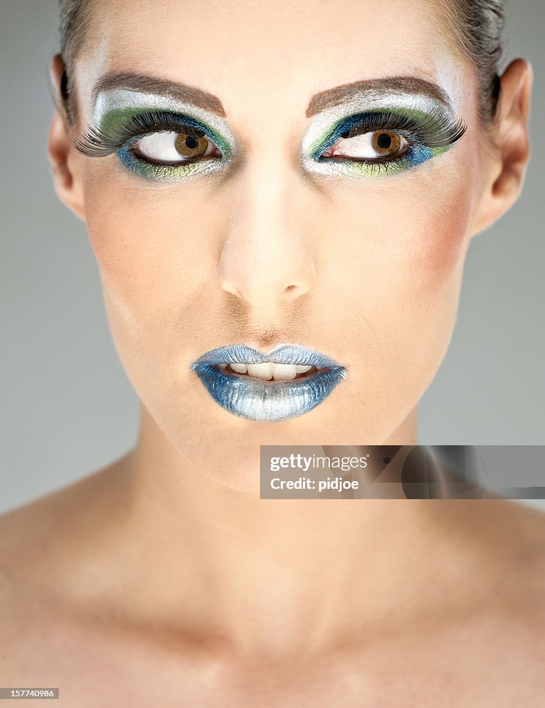 Young adult woman with glamorous make up.