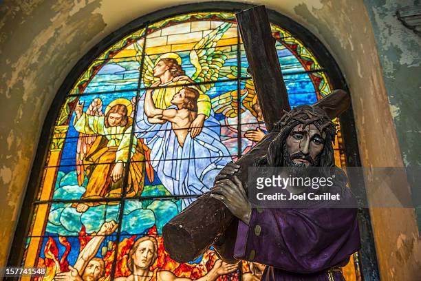 christ carrying cross in san juan cathedral - stained glass angel stock pictures, royalty-free photos & images