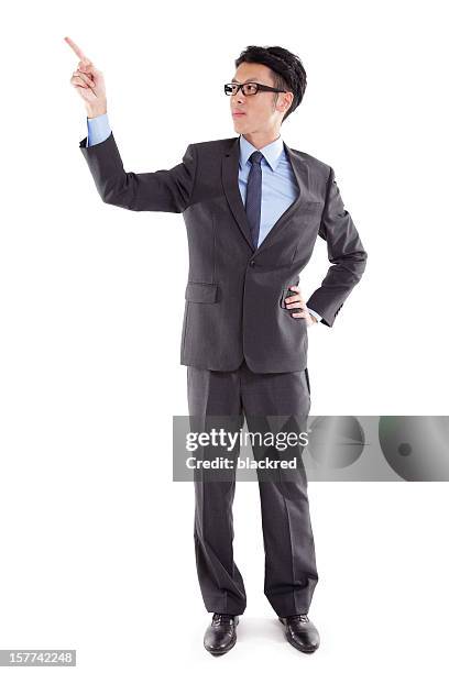 businessman pointing - guy pointing stock pictures, royalty-free photos & images