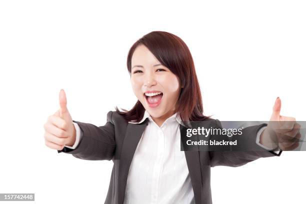 excited chinese businesswoman two thumbs up smiling on white background - super excited suit stock pictures, royalty-free photos & images