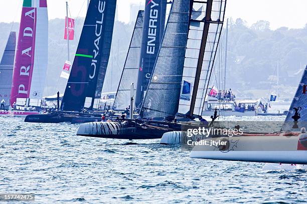 catamaran yacht racing start - racing catamaran stock pictures, royalty-free photos & images