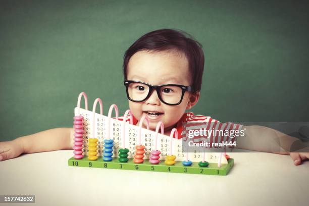 cute asian baby do arithmetic - mathematician stock pictures, royalty-free photos & images