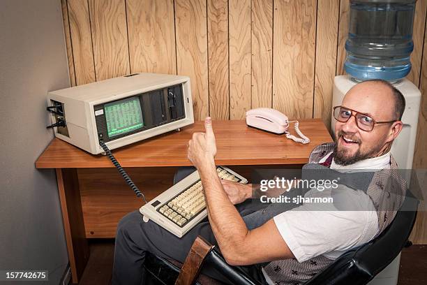 thumbs up computer worker nerd  on phone at cubicle - old fashioned computer stock pictures, royalty-free photos & images