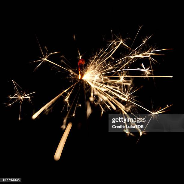 burning sparkler isolated on black - burning fuse stock pictures, royalty-free photos & images