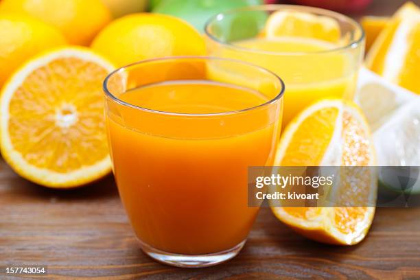 citrus-saft - mango juice stock-fotos und bilder