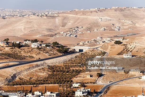 jew and arab in west bank landscape - palestinian stock pictures, royalty-free photos & images