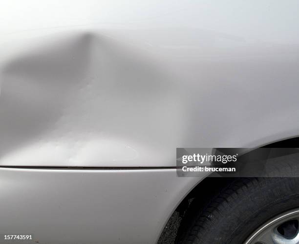 close-up of a dent in a gray car exterior - bumper 個照片及圖片檔