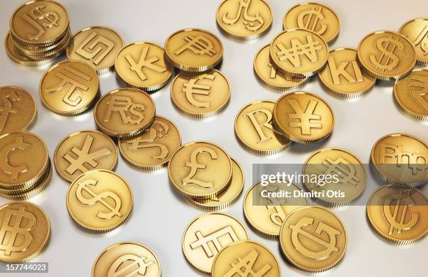 gold international currency coins - wisselkantoor stockfoto's en -beelden