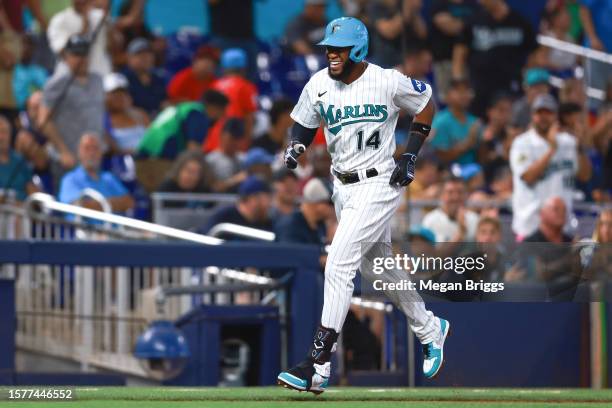 Bryan De La Cruz of the Miami Marlins reacts after hitting a home run against the Detroit Tigers during the first inning at loanDepot park on July...