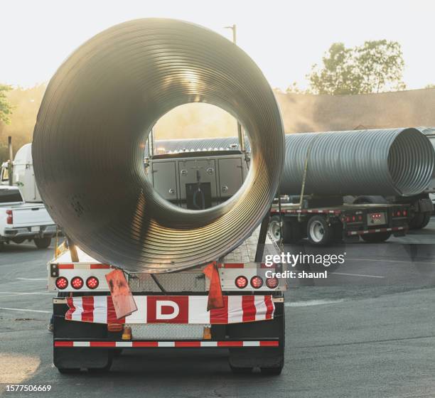 culverts unloading - flood preparation stock pictures, royalty-free photos & images