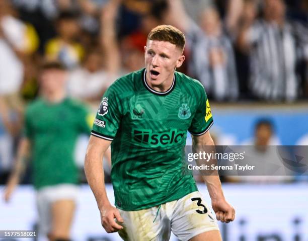 Elliot Anderson of Newcastle United celebrates with teammates after scoring the equalising goal during the Premier League Summer Series match between...