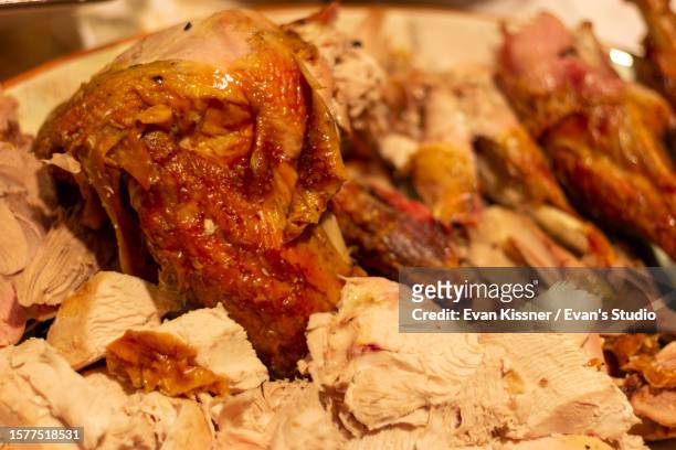 carved thanksgiving turkey - evan kissner stock pictures, royalty-free photos & images