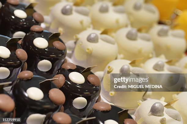 Pastries are displayed at a shop of French gourmet food company Fauchon, on December 6, 2012 in Paris. AFP PHOTO MIGUEL MEDINA