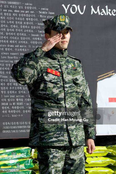 Actor Hyun Bin poses for photographs after being discharged from military service on December 6, 2012 in Gyeonggi-do, South Korea.