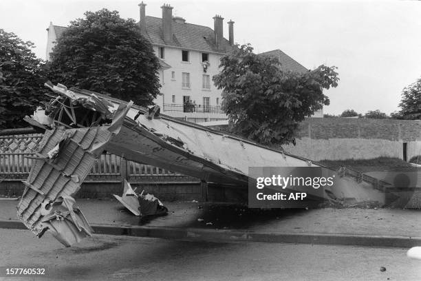 View of the wreckage of the Tupolev 144 that crashed during the Paris air show, killing all six on board and eight on the ground, destroying 15...