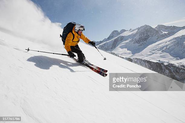 skier downhill - skiën stockfoto's en -beelden