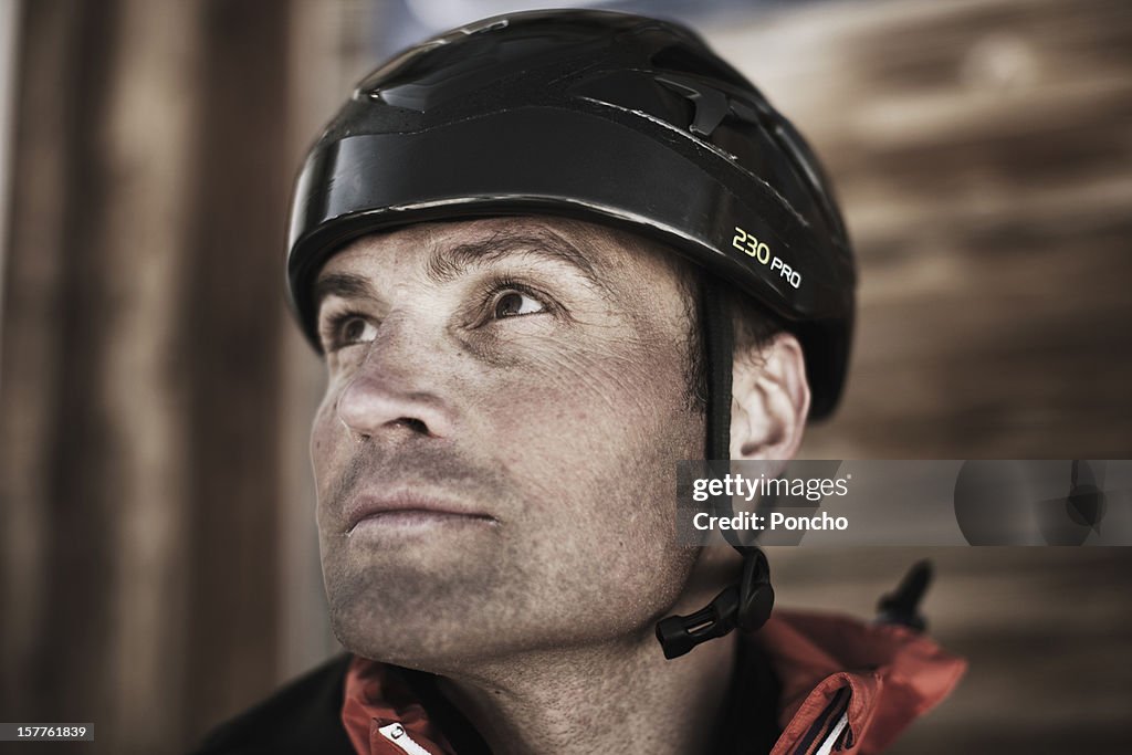 Portrait of a mountaineer with helmet